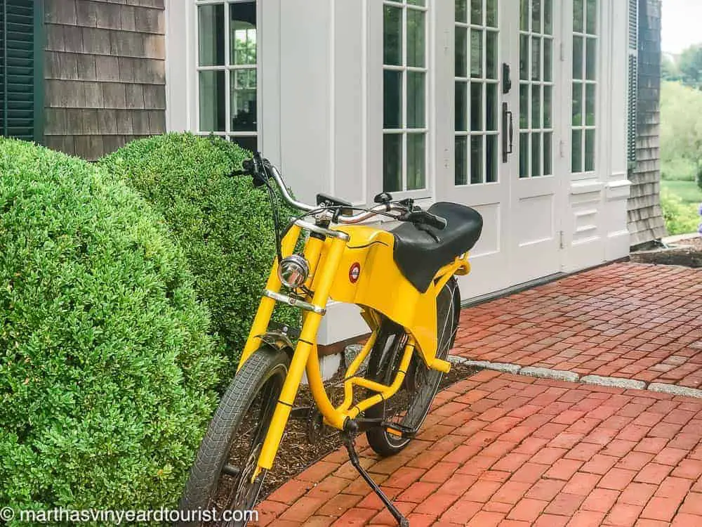 bike in front of white French doors