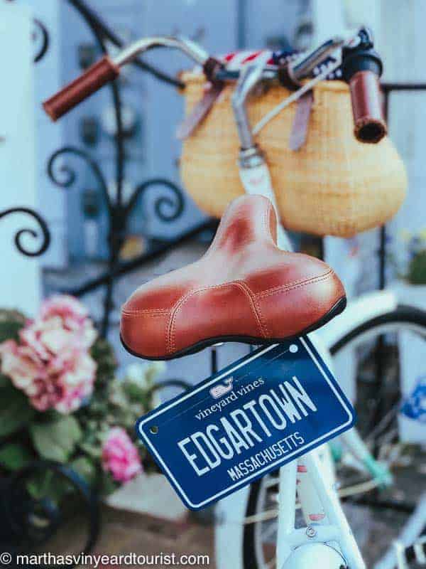 A bike plate with the words Edgartown attached to a classic bike with basket
