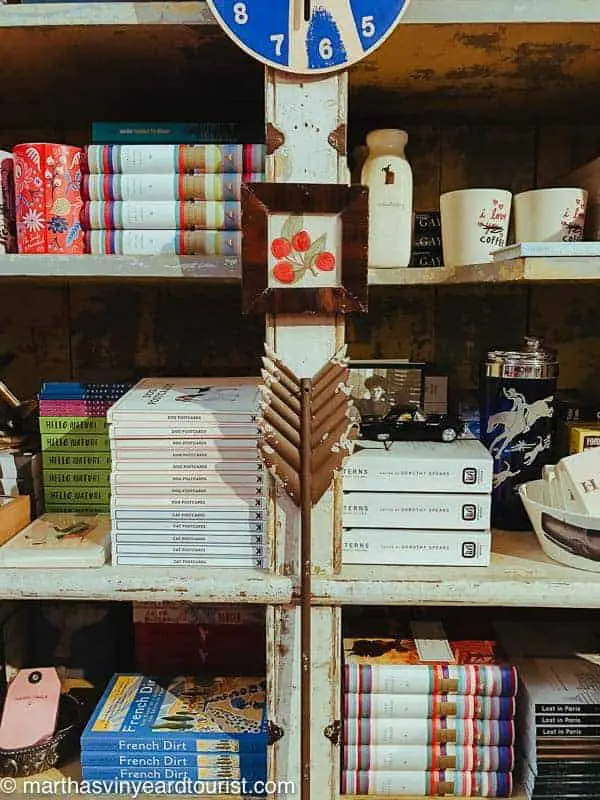 a shelfie of books and other items in a store