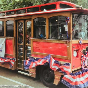 Edgartown trolley with bunting for July 4th parade