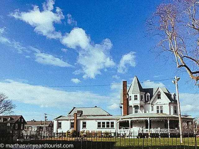 but sky in Newport RI over a white mansion