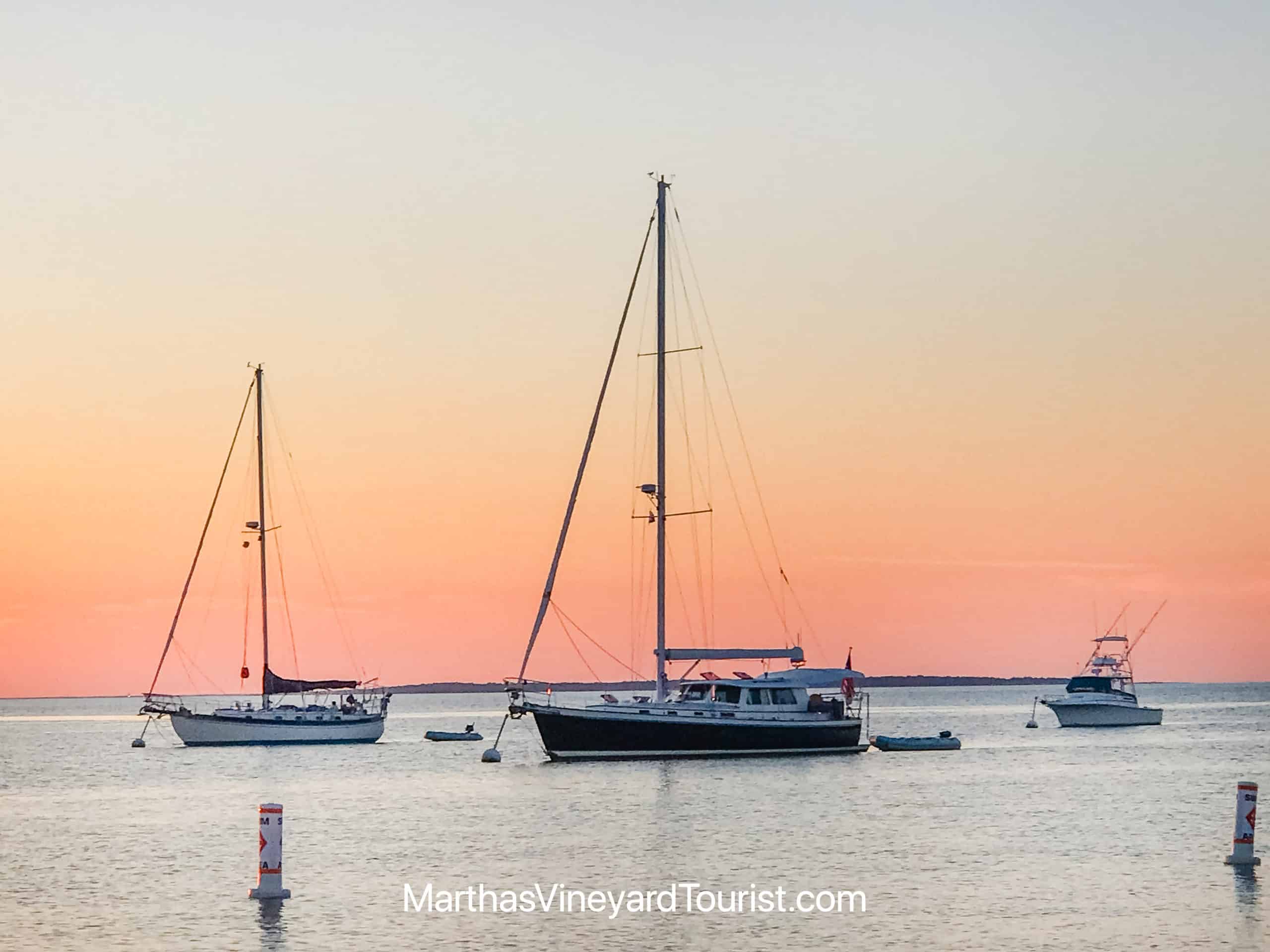 sunset over sailboats at Menemsha Beach